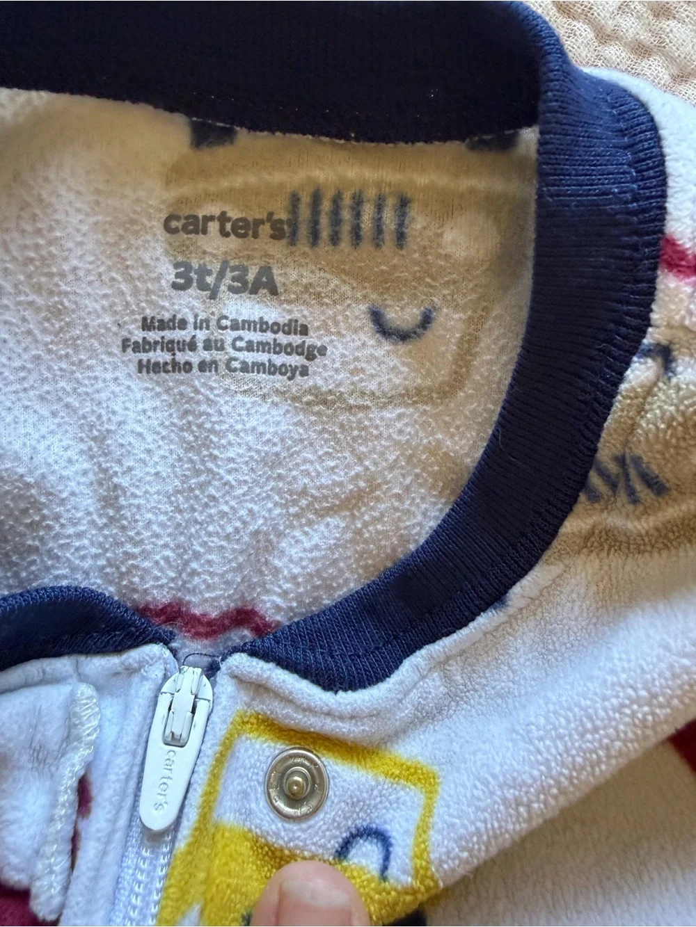 Carter's White Footed Pajamas with Red, Yellow and Blue Car Motif